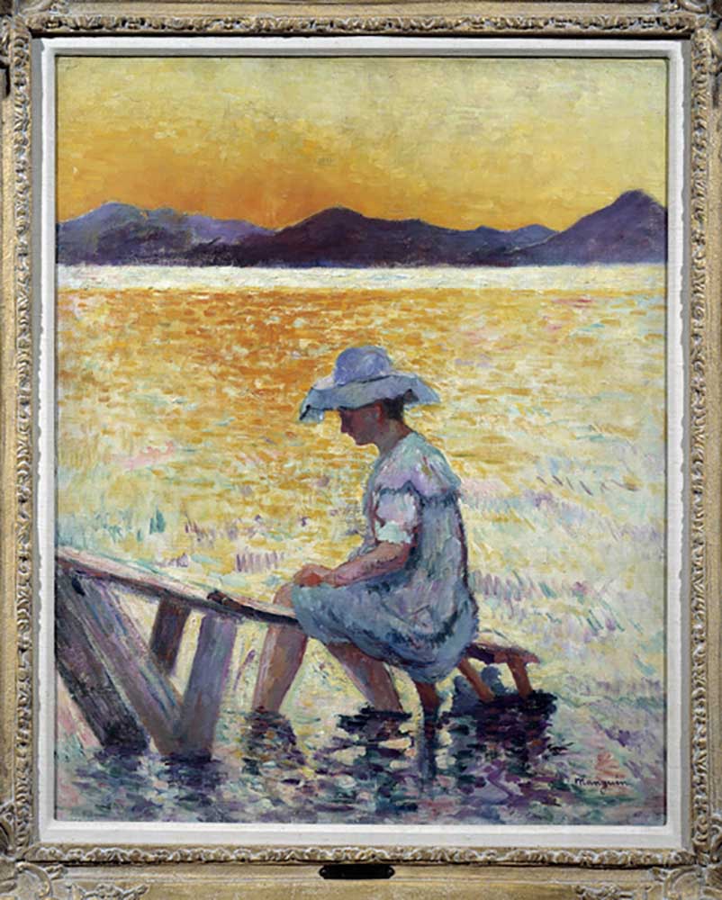 Saint Tropez, Sonnenuntergang Eine Frau sitzt mit den Füßen im Wasser am Ufer. Gemälde von Henri Man von Henri-Charles Manguin