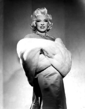 American Actress Mae West with fur stole c. 1940