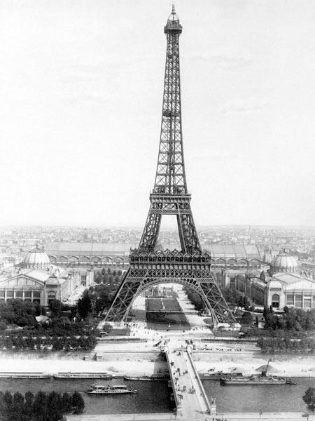 end of the building of the Eiffel Tower in Paris for World Fair in Paris 1889 , here photographed at March 31, 